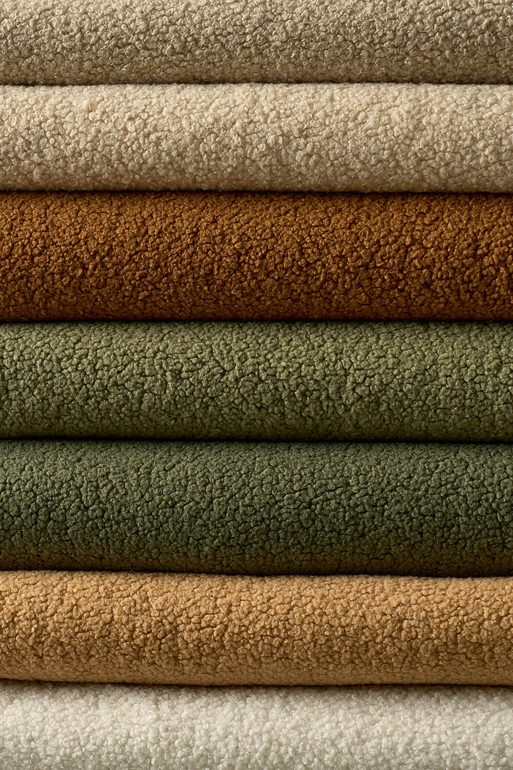 Boucle fabric stacked in a neat pile