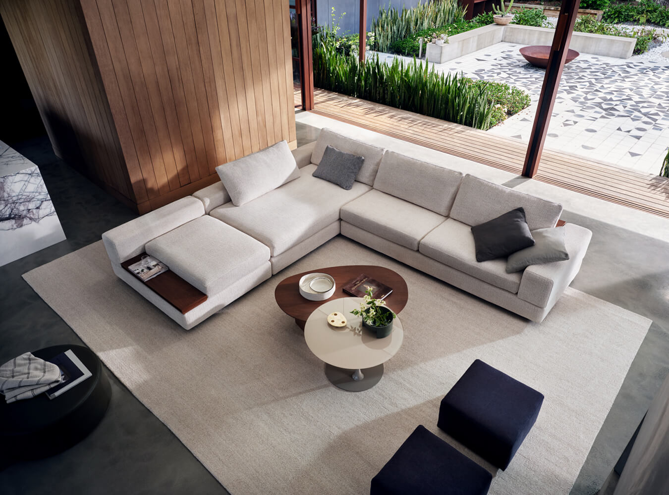 A light grey sofa in a contemporary living room.