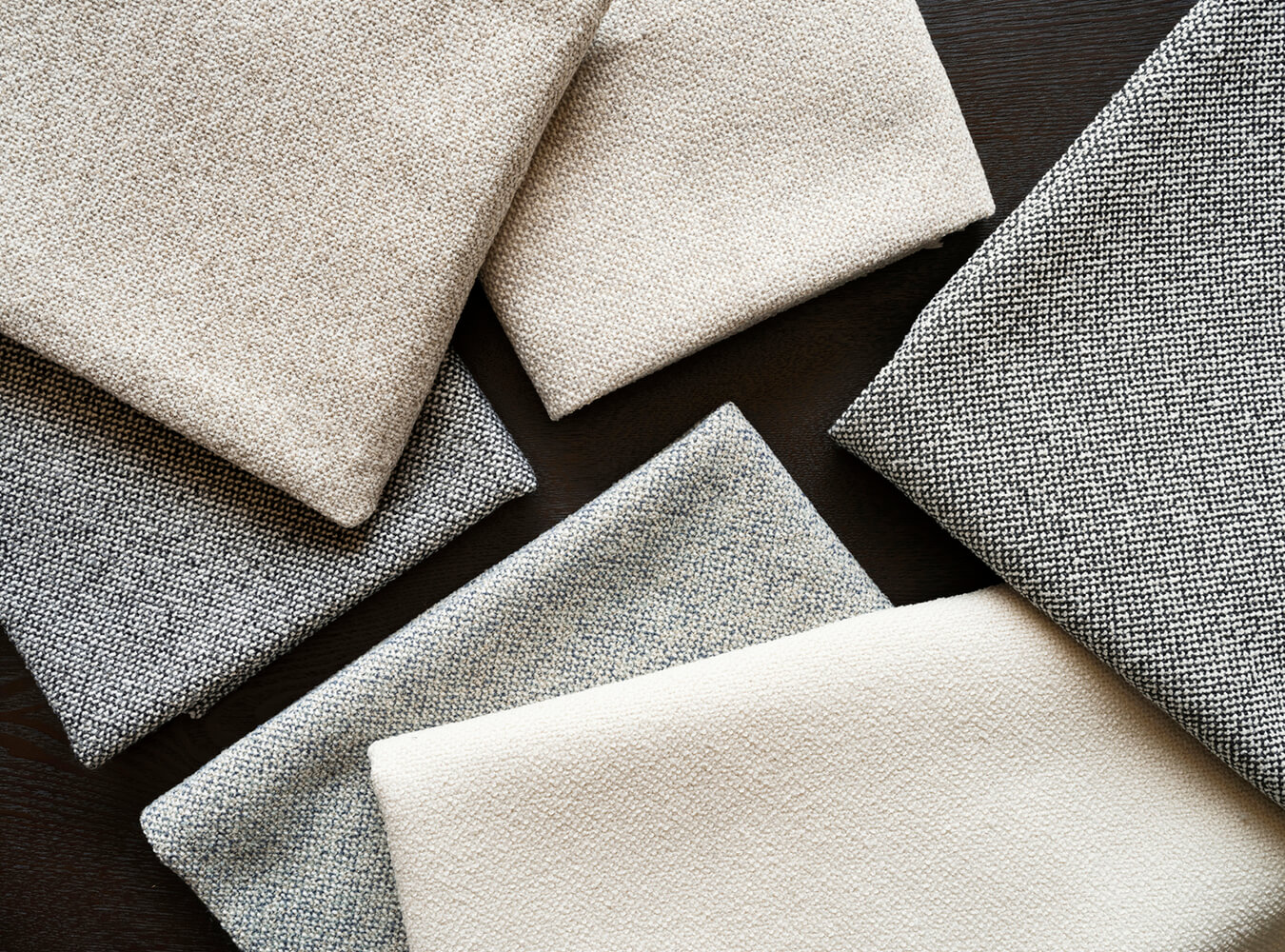 Folded neutral fabrics artfully arranged