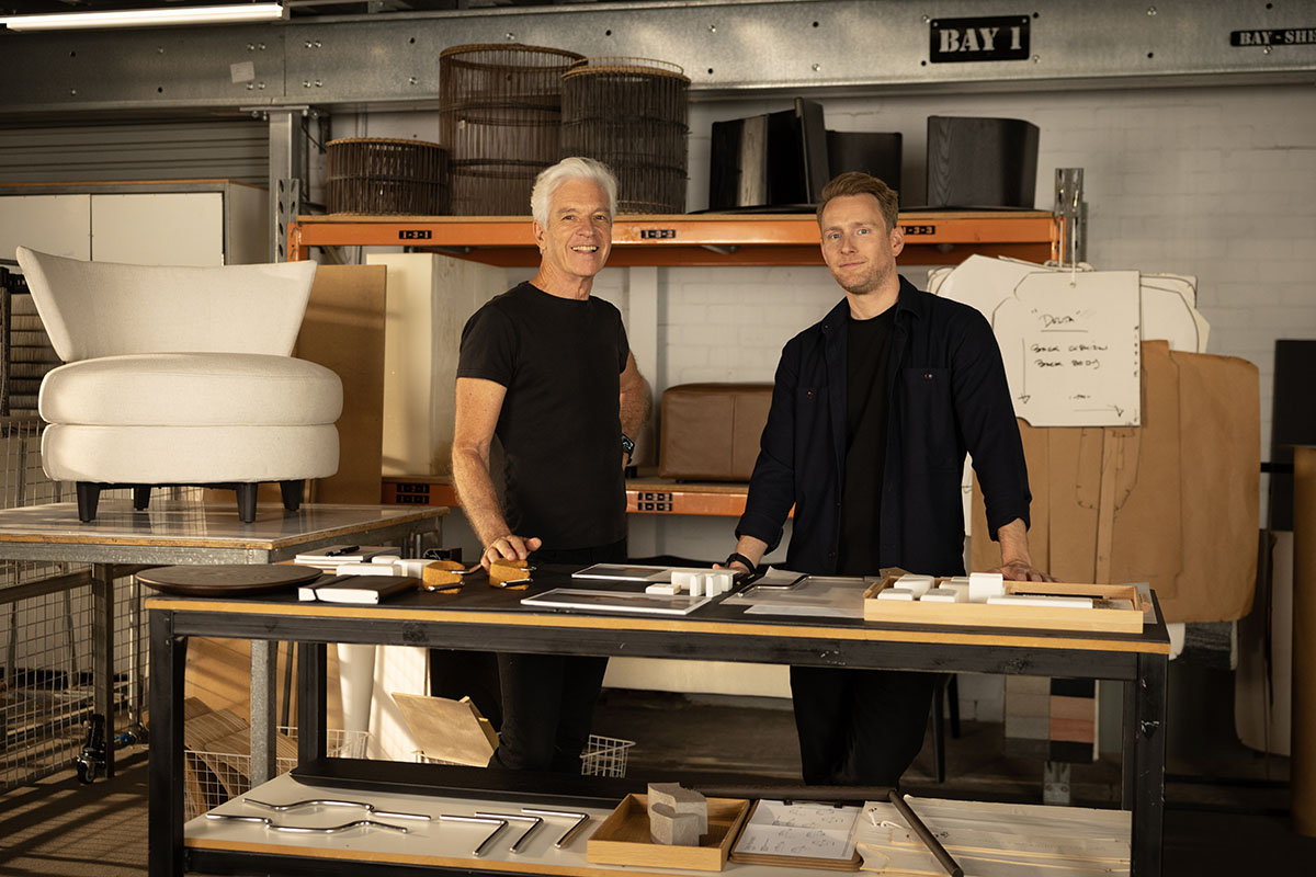 Behind the scenes look at the King Living studio setting with sofa prototypes, samples and design sketches on the table.