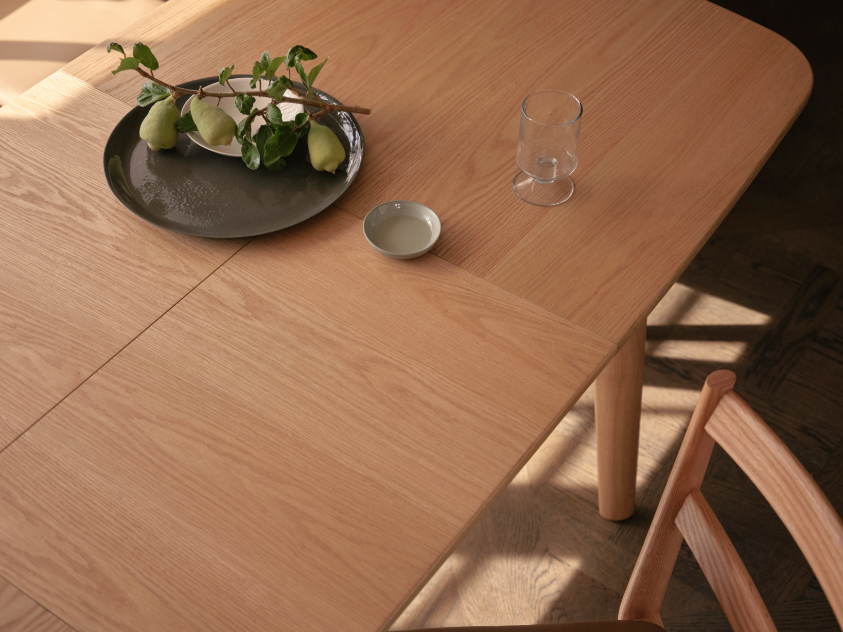 An extendable four seater dining table finished in a light contemporary timber, extending seamlessly up to six.