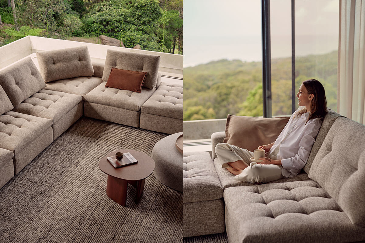 The Max modular L-shaped sofa in a textured natural fabric, styled with a round timber coffee table and layered cushions in a serene living space.