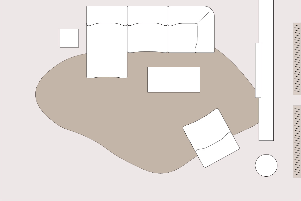 Organic rug and chaise of a modular sofa zoning a small loft living room layout into distinct areas, styled with a coffee table, armchair and side tables for multi-purpose living.
