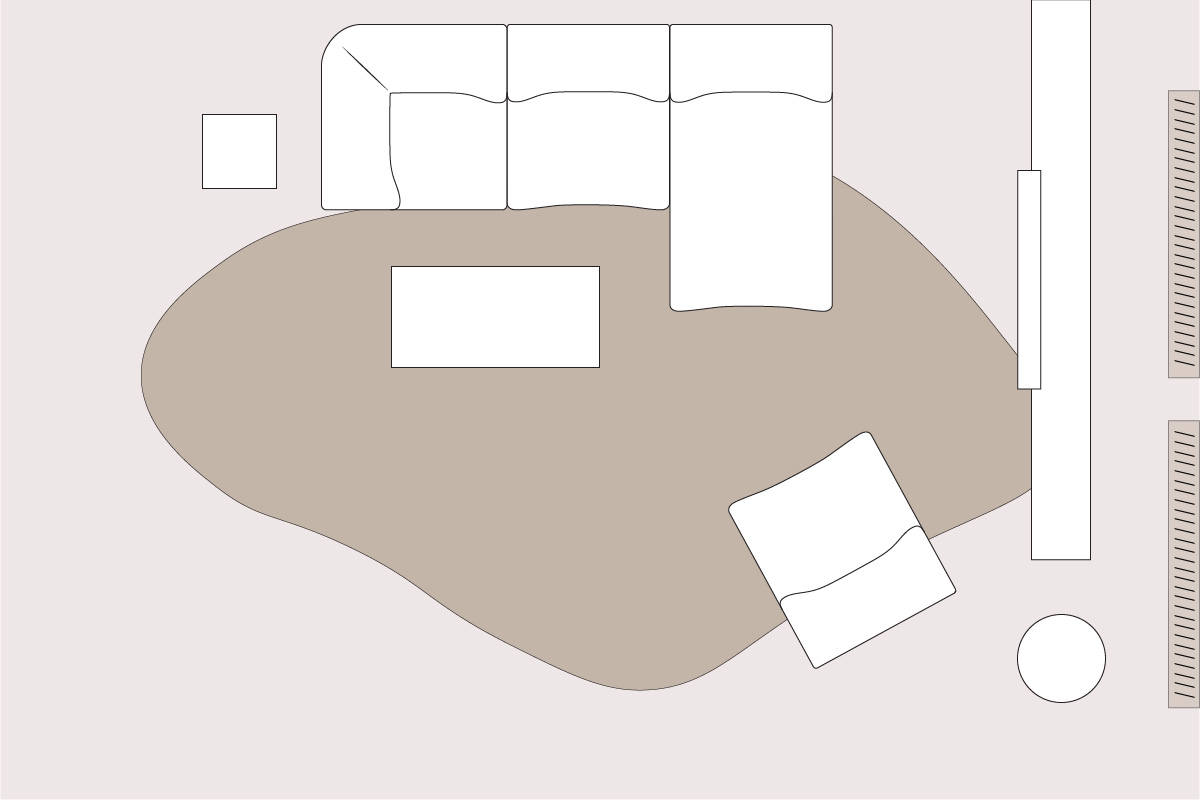 Compact living room layout for a small apartment with corner sofa placement, organic rug shape and minimal furnishings to open up the floor area.