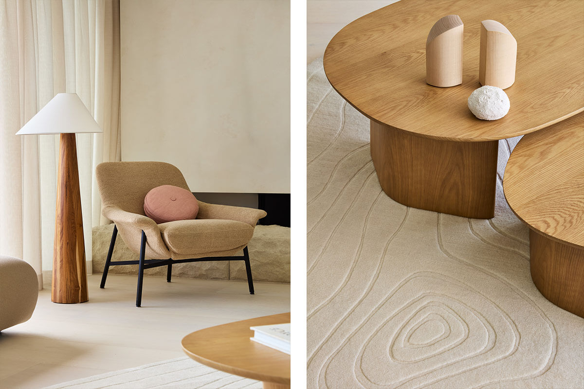 A modern Nordic living space with timber lamp, woven accent chair, natural oak curved coffee tables styled with ceramic décor.