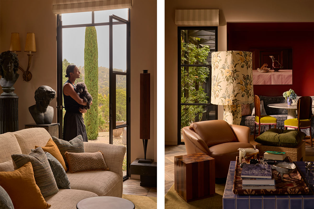 Eclectic living room filled with a myriad of decor, a large sofa and an oversized lamp.