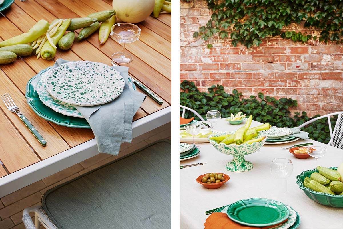 Outdoor dining table styled with vibrant, colourful tableware, fresh fruit and botanical green accents for summer entertaining.