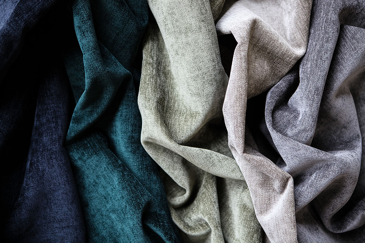 Five textural fabrics arranged side by side
