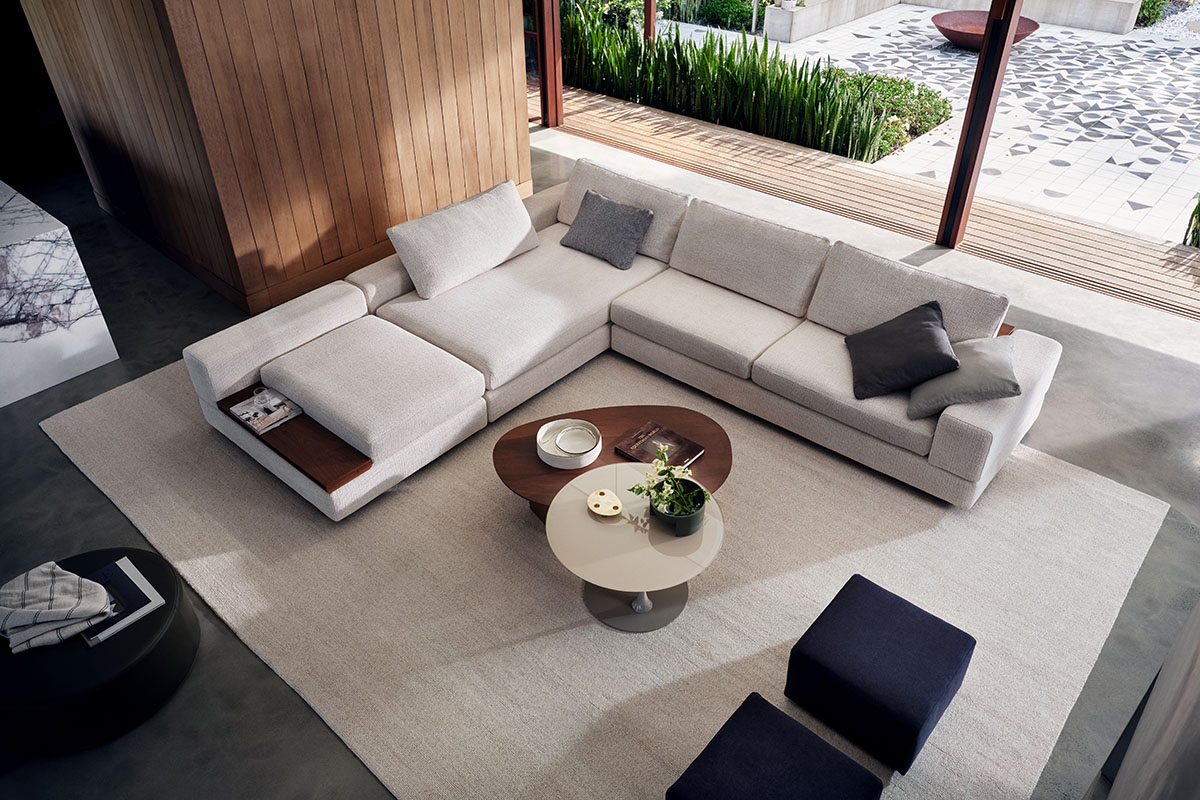 A light grey sofa in a contemporary living room.